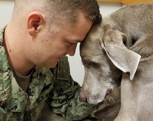 Veteran bonding with his dog