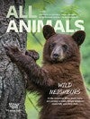 Cover of All Animals Magazine with a photo of a young bear climbing a tree