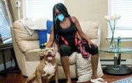 Portrait of Denise Young with her dog Drama.