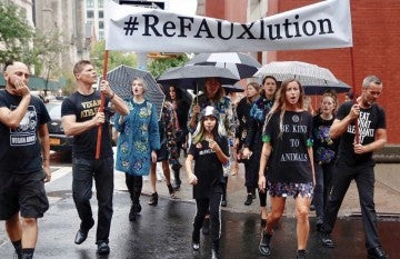 Activists and volunteer models for faux designer Anna Tagliabue of Pelush demonstrate on the streets of New York, which is considering banning the production and sale of animal fur.