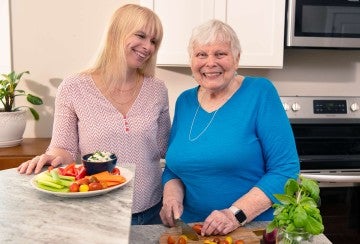Karin and Carolynne Kreutzer cooking
