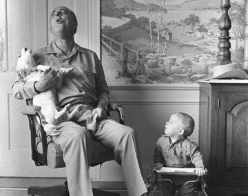 Lyndon Johnson and Yuki howl while his grandson watches on
