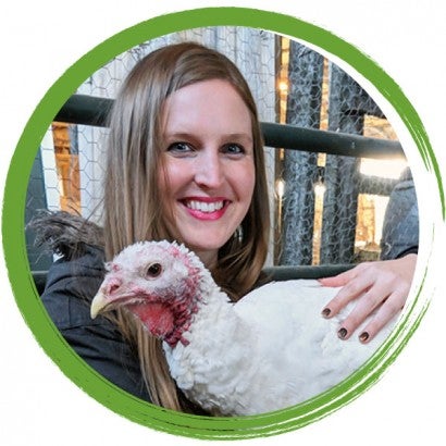 Julie Knopp holding a turkey