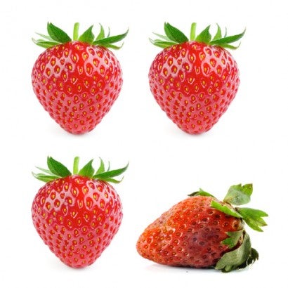 Four strawberries, one is rotten