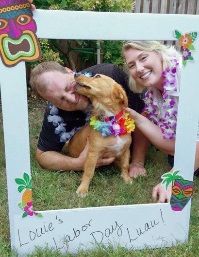 Louie, Jenn and Charlie at Louie's Luau to celebrate the end of his heartworm treatment