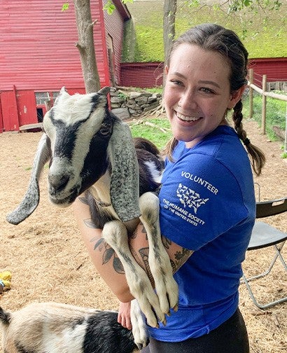 Maxine Young holds a goat