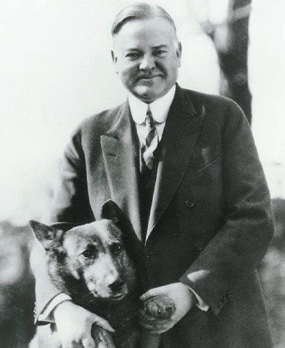 Herbert Hoover with his dog King Tut
