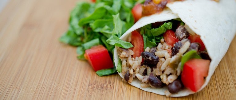vegan burrito with black beans, rice and veggies
