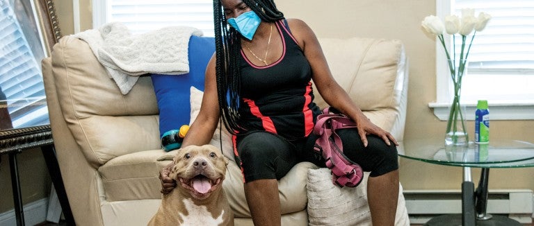 Portrait of Denise Young with her dog Drama.