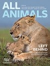 Cover of All Animals Magazine with a photo of a female lion and her cub.